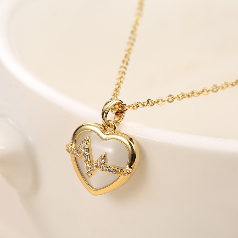 04b6df5e 6d69 4854 94fb f0c8ec396237 18K Gold Plated Stainless Steel Heart Pendant Necklace In Titanium