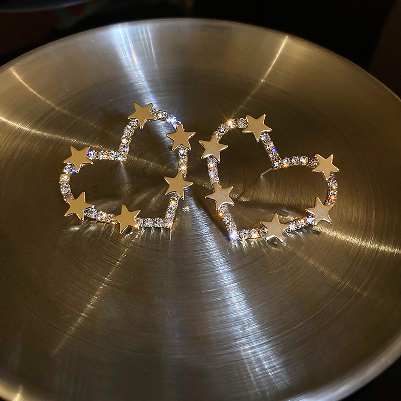 0ac06fda e9b8 4bf3 971a ecf23929fa69 Fashion Metal Cold Wind Earrings Simple