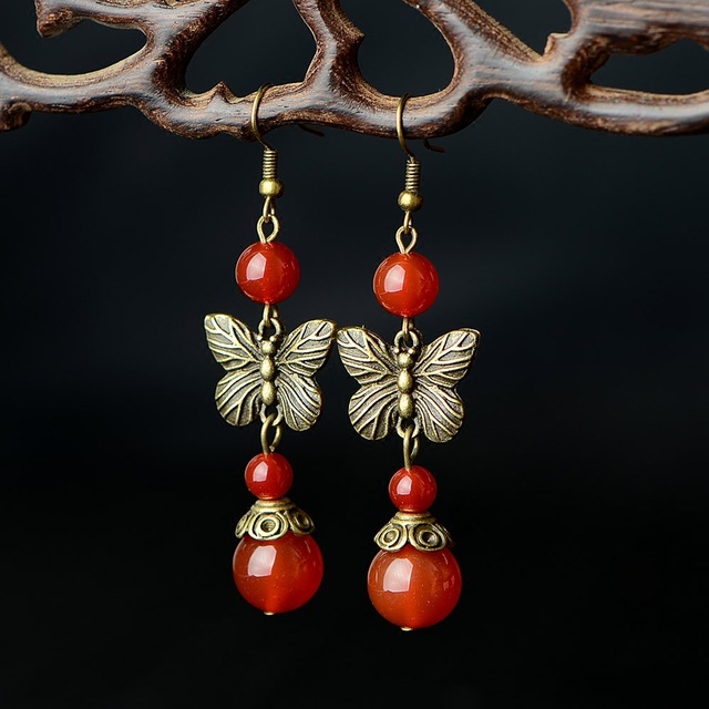 0fdea5c9 d313 4a1c a776 6e3de32e0f79 Ladies butterfly vintage red agate earrings