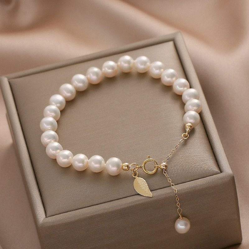 14b0b8a2 5f57 4b3c b13e 358532444d0d Natural Freshwater Pearl 14K Gold Niche Design Elegant Bracelet