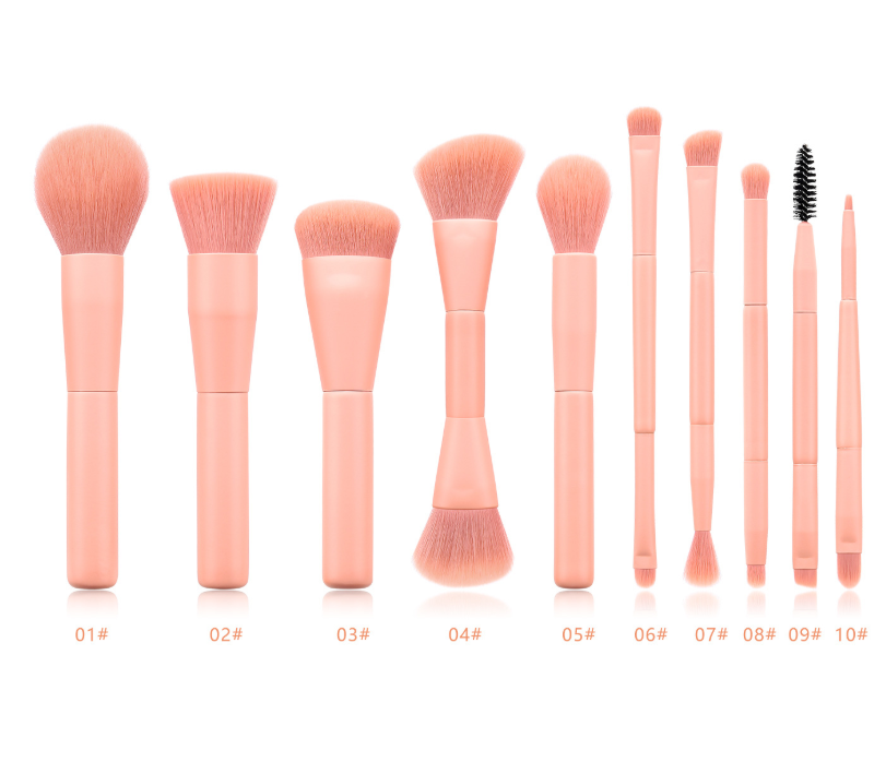 different types and sizes of pink makeup brushes