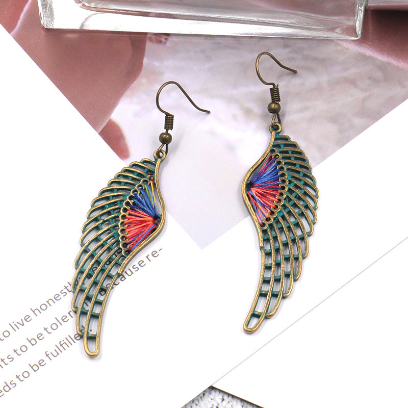 1613636307531 Popular Hollow Alloy Angel Wings Earrings Women