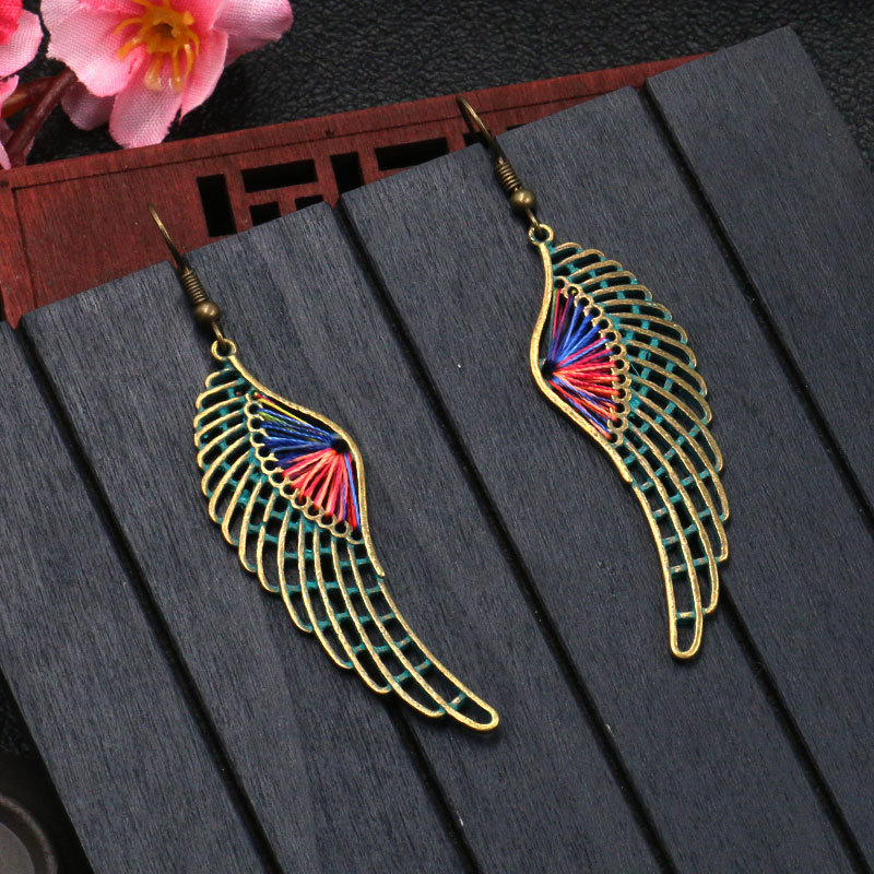 1613636307546 Popular Hollow Alloy Angel Wings Earrings Women