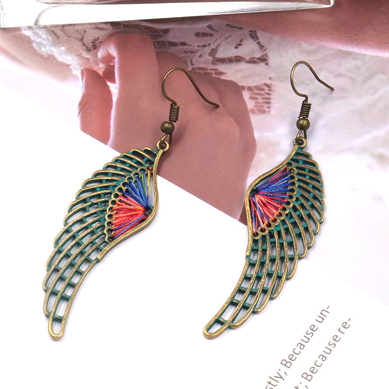 1613636307547 Popular Hollow Alloy Angel Wings Earrings Women