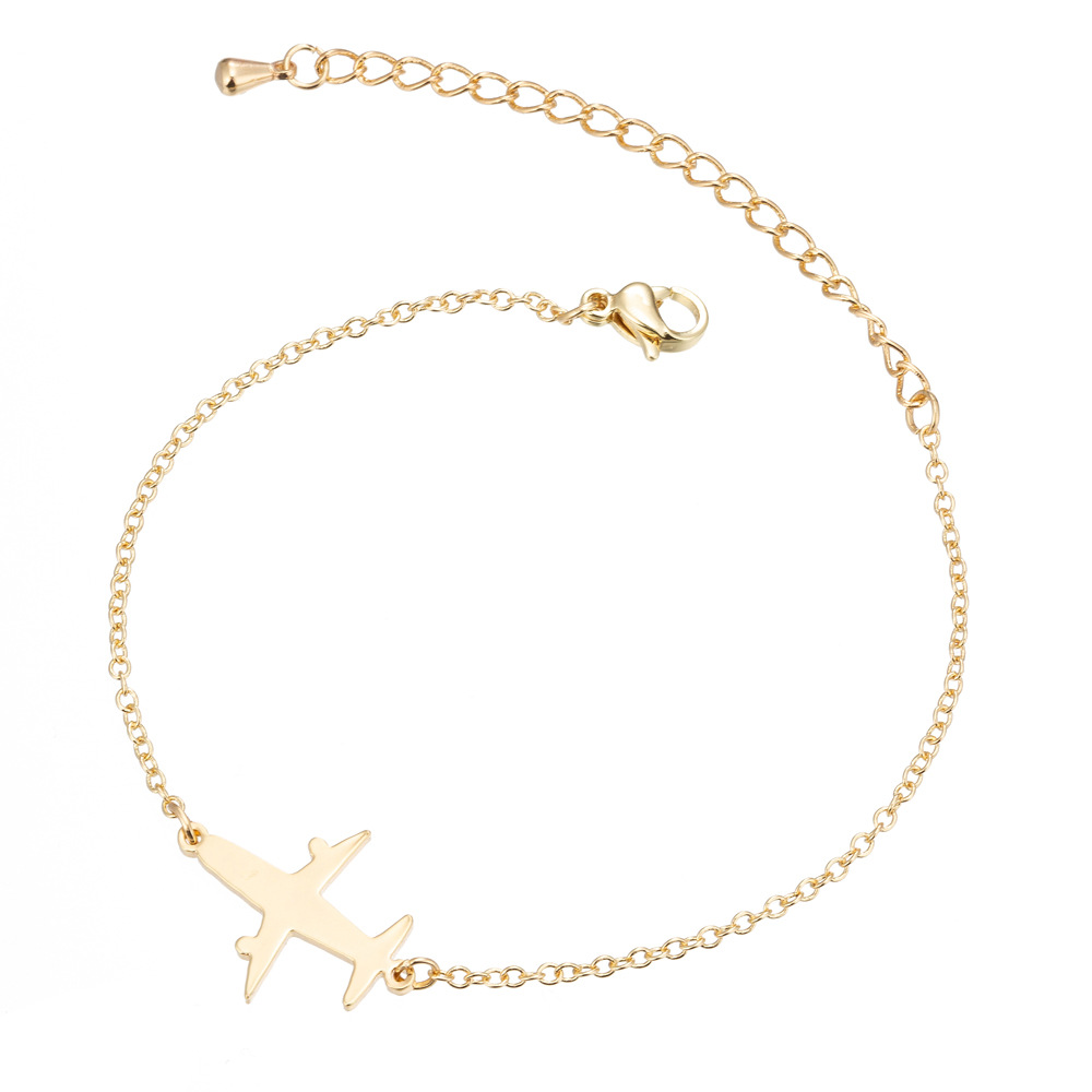 Gold Unique Aircraft Bracelet with aviation-themed charms for aviation enthusiasts Meléche Jewelry USA