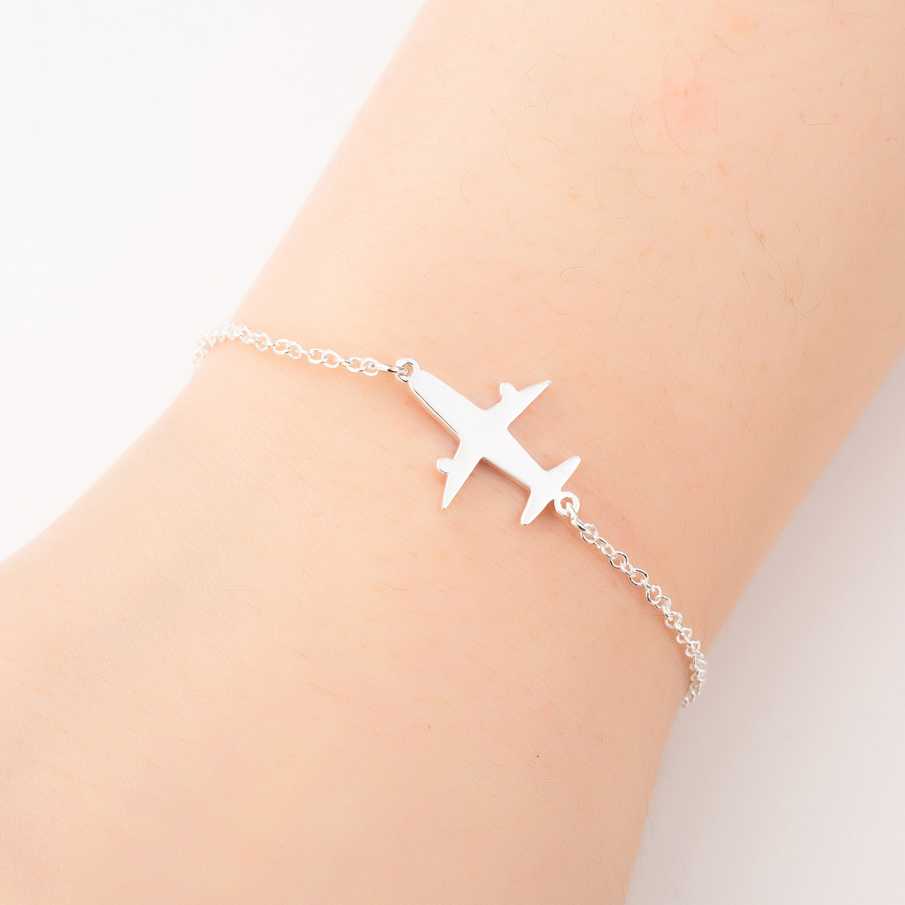 Silver s925 Unique Aircraft Bracelet with aviation-themed charms for aviation enthusiasts Meléche Jewelry USA