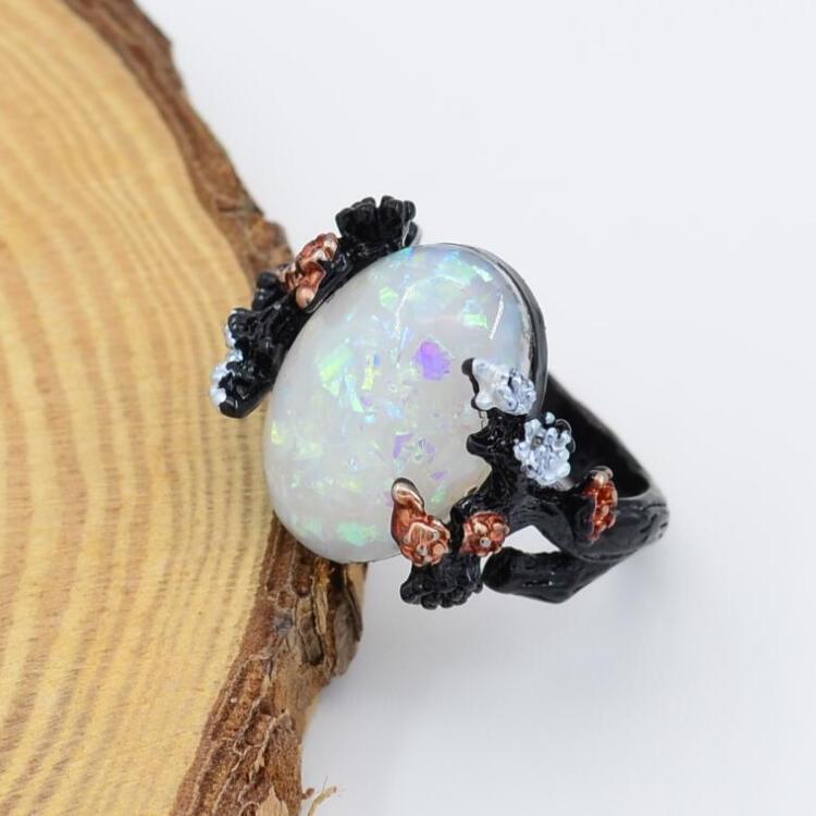1710466693974855680 Vintage Flower Opal Ring Black Gold Finger