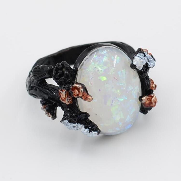 1710466695547719680 Vintage Flower Opal Ring Black Gold Finger