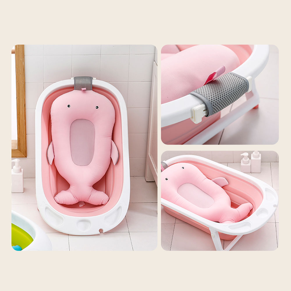 "Colorful baby-shaped bath mat featuring playful patterns, perfect for bath time fun and safety."