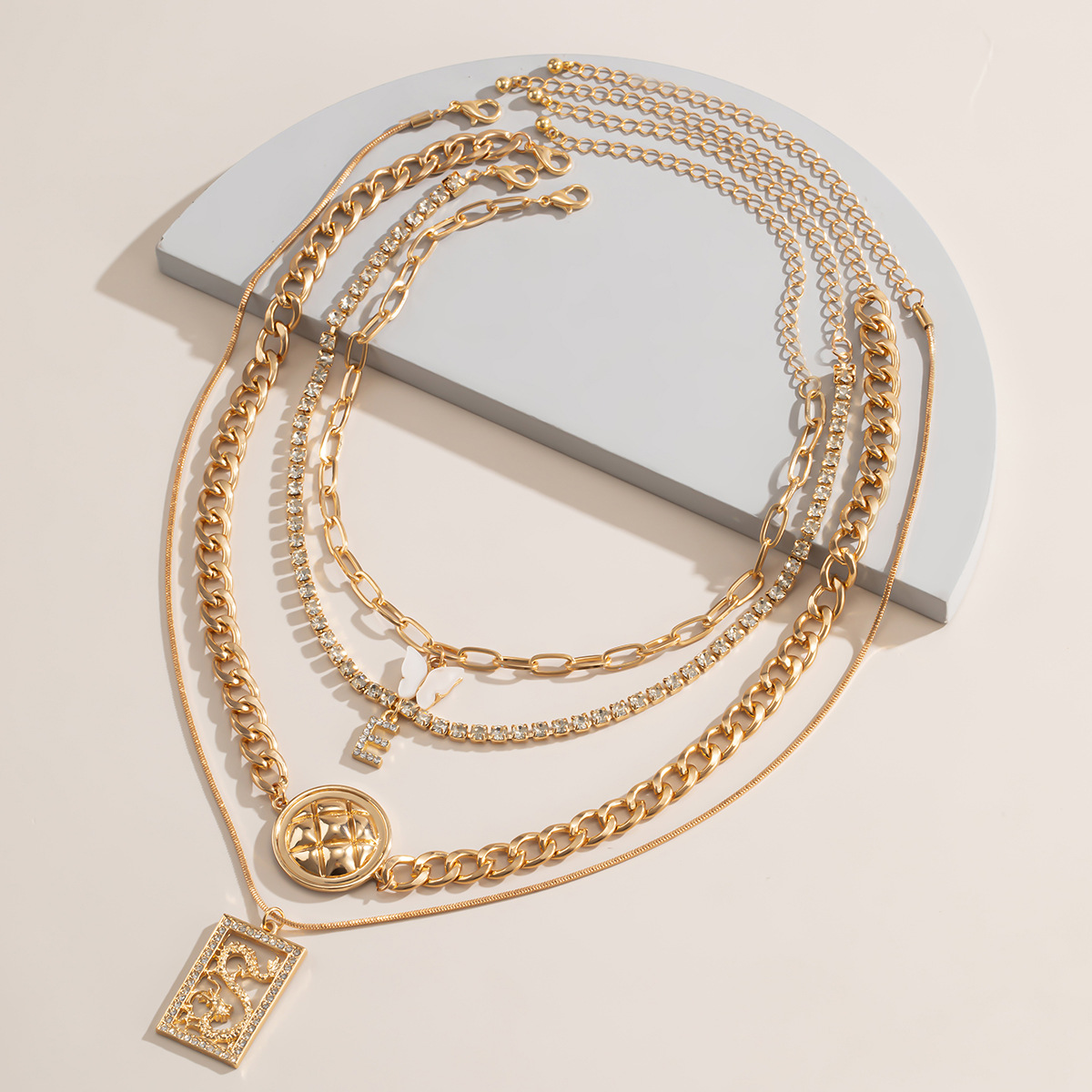 26e532d4 fd15 4b23 b463 127d87fa1d63 Multi-element Suit Necklace Retro Fashion Butterfly Letters