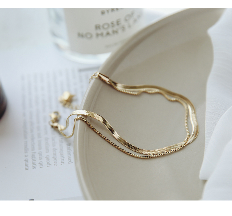 29008863 92ca 4139 8bf0 497d277bb713 18K Rose Gold Plated Double Snake Bone Anklet