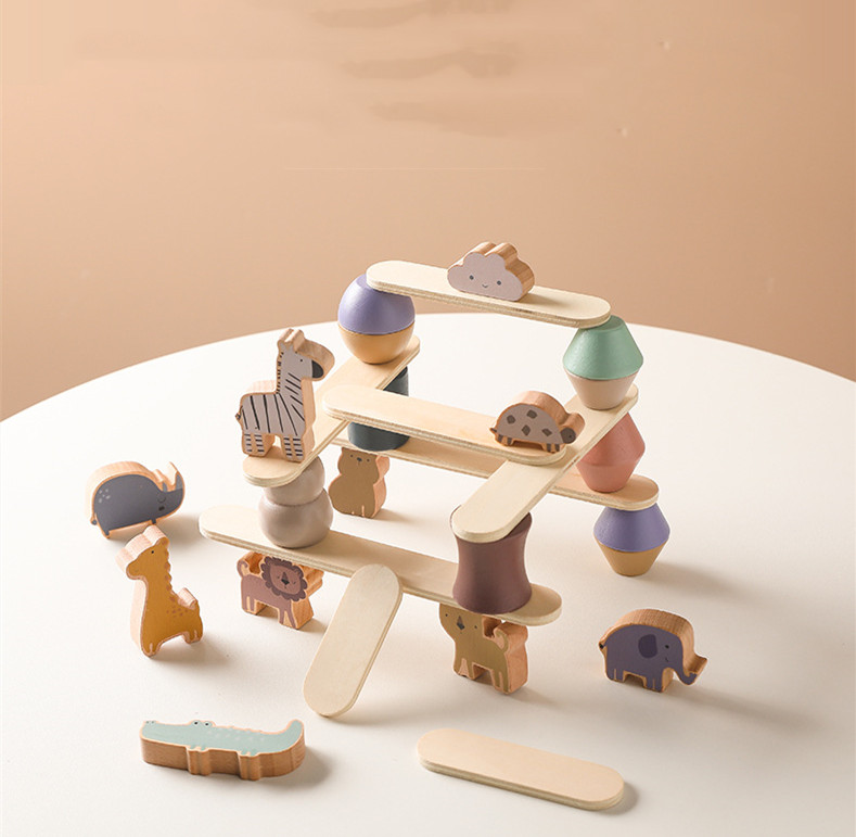 A balanced Soulful Trading Montessori Educational Wooden Toy featuring animal-shaped pieces and interlocking sticks on a beige surface, all crafted from non-toxic materials.
