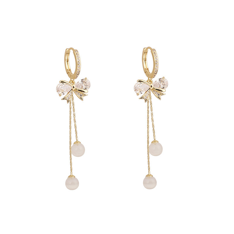 2dbabfef 9f35 4bb6 99fb 14afec87a97f Fashion Women's Alloy Bow Cat's Eye Earrings