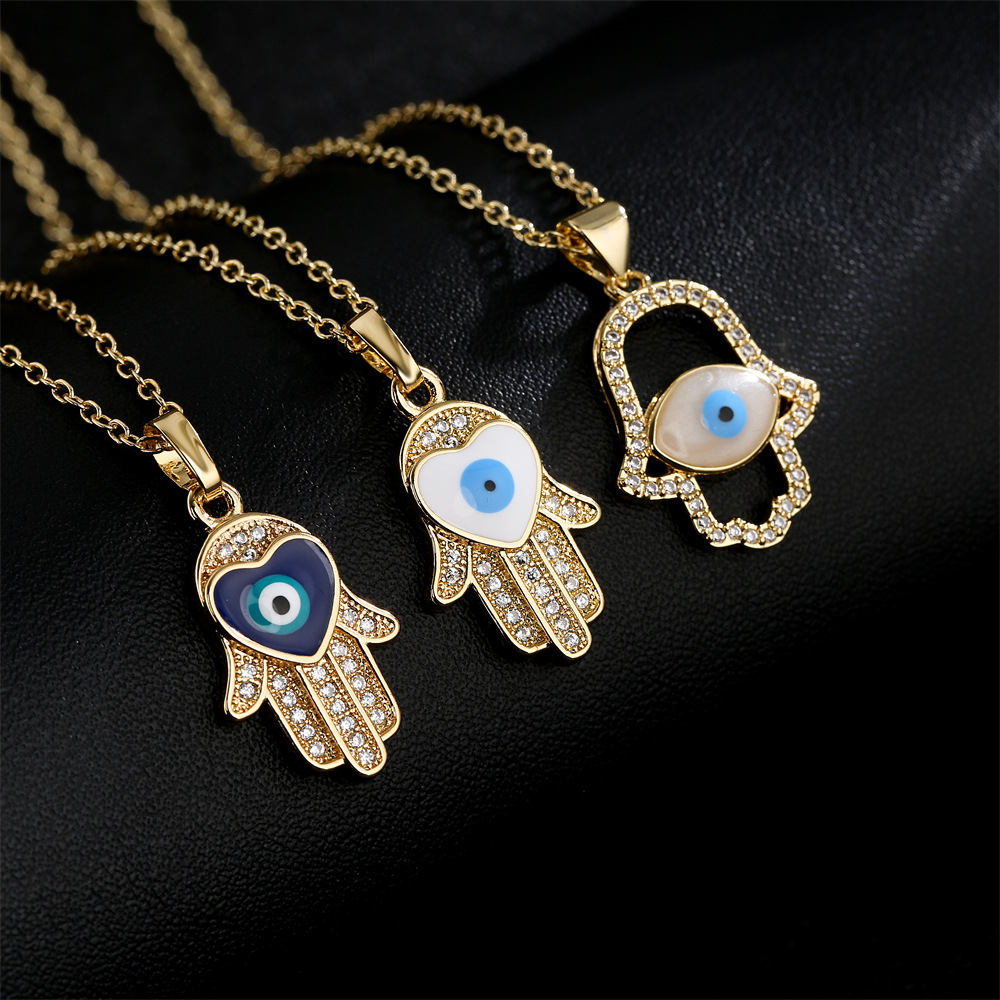 45435eec a2f4 4321 8c71 6ac123143c5e Gold Dripping Zircon Fatima Hand Minority Demon Eye Clavicle Chain Female