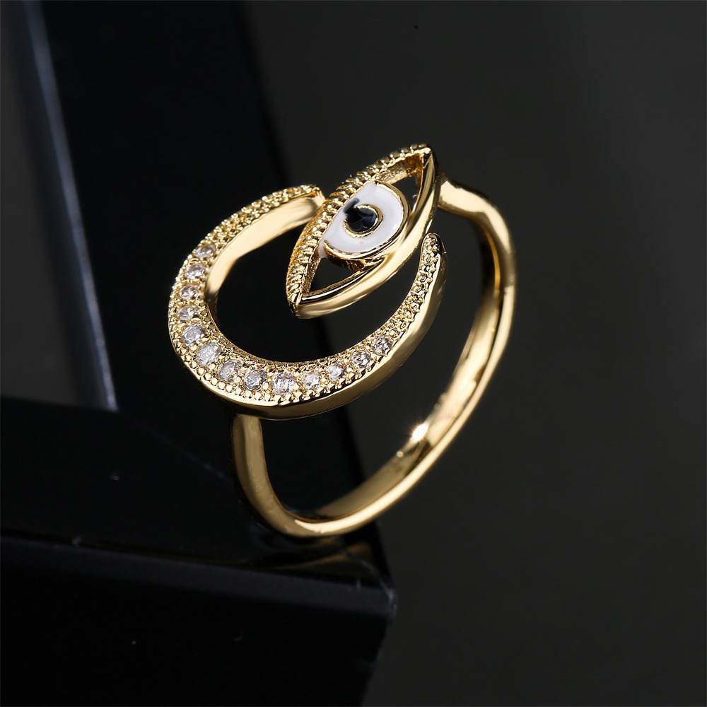 4609e5f5 7b9f 4819 80d5 1b52ac0306ec Hot New Copper Plated Gold Dripping Eyes Moon Zircon Ring