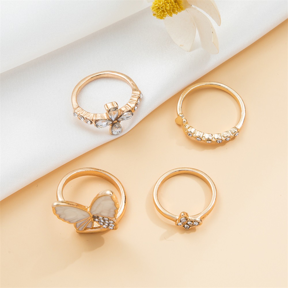 4941b225 fcab 41f4 a946 022ec2d154cb Creative Geometric Gold Plated Statement Knuckle Rings Set