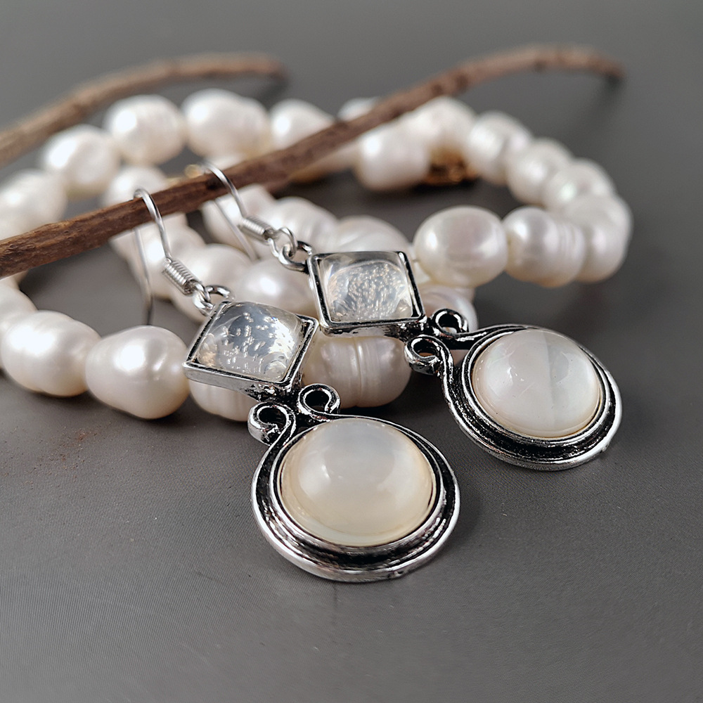 515fd165 adc8 43d0 a774 5791fbf8c0bb European and American creative Thai silver moonstone long earrings ear hooks