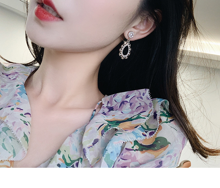 536a9e66 851e 400a 8776 a0967f64aa22 Hollow Water Drop Earrings with Pearl and Diamonds