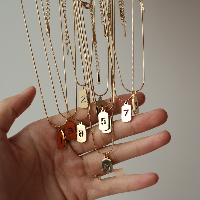 54e28d20 600c 4fb7 a1ff 0119f393ff42 Lucky Number Stacked Square Brand Stainless Steel Necklace