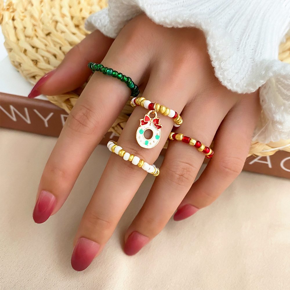 5551b91f cbd6 43c5 b861 7860741dd075 Christmas Rice Bead Ring 4 Pieces Set