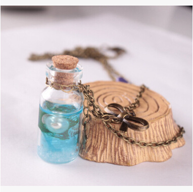 5684851a 5f08 43a9 889a 94c0db756724 Drift bottle bow glass cover necklace