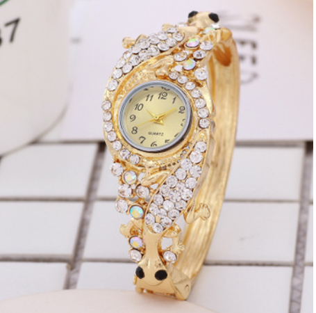 5f057dbc df75 45a1 8b41 8e5f256f76e4 Diamond and gold bracelet watch
