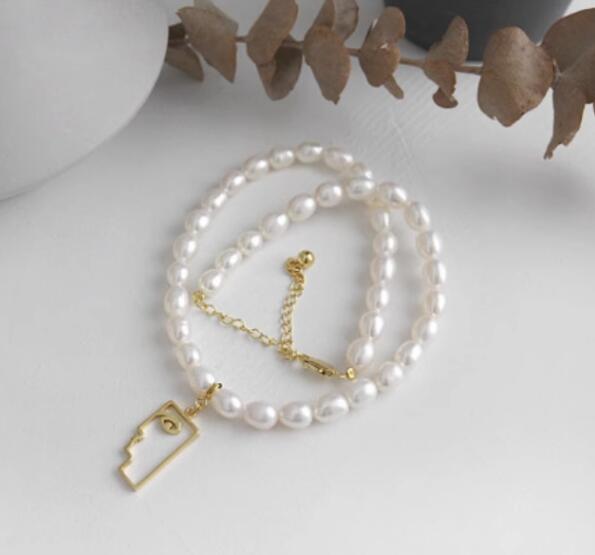 601deb6f 0d09 488a ac12 e0909259c66a French Vintage Freshwater Pearl S925 Sterling Silver Plated K Gold Statue Necklace