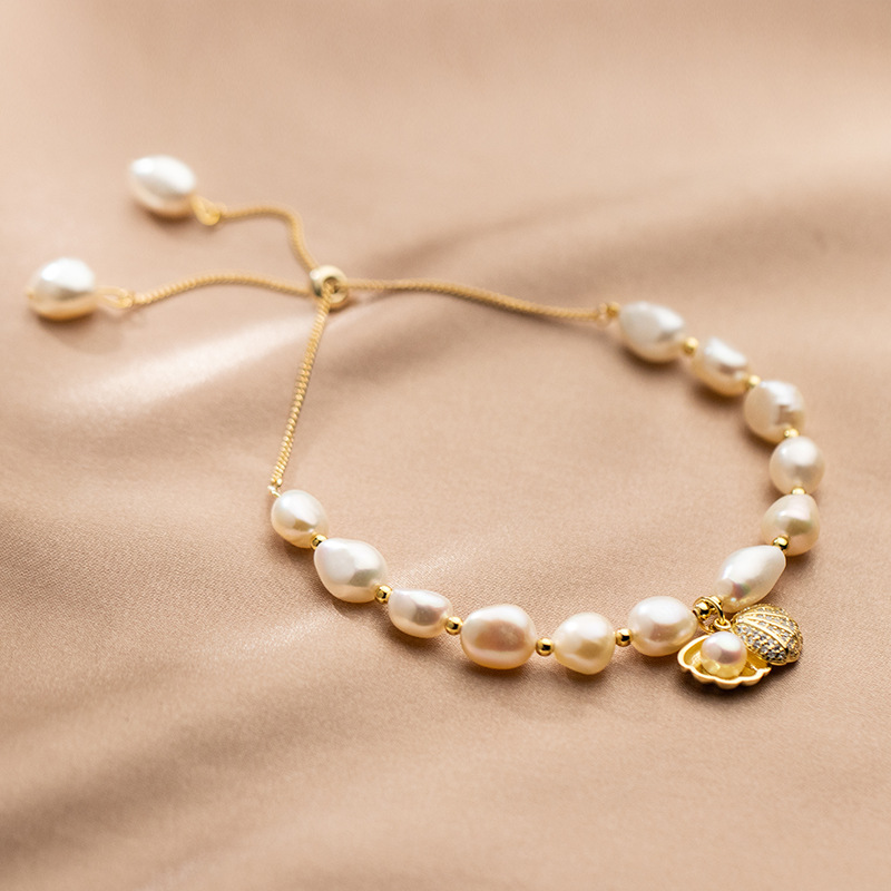 6c8d8944 3b79 4a43 b95a e59d8204be1b S925 Silver Pearl Diamond Inlaid Shell Small Gold Bead Bracelet
