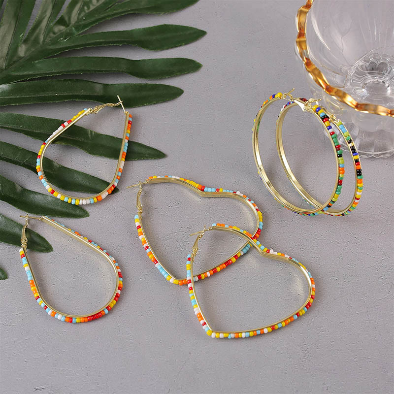 6fe6c977 bedd 4d2c 824f 8658fffe19f5 Geometric Handmade Rice Beads Heart Earrings