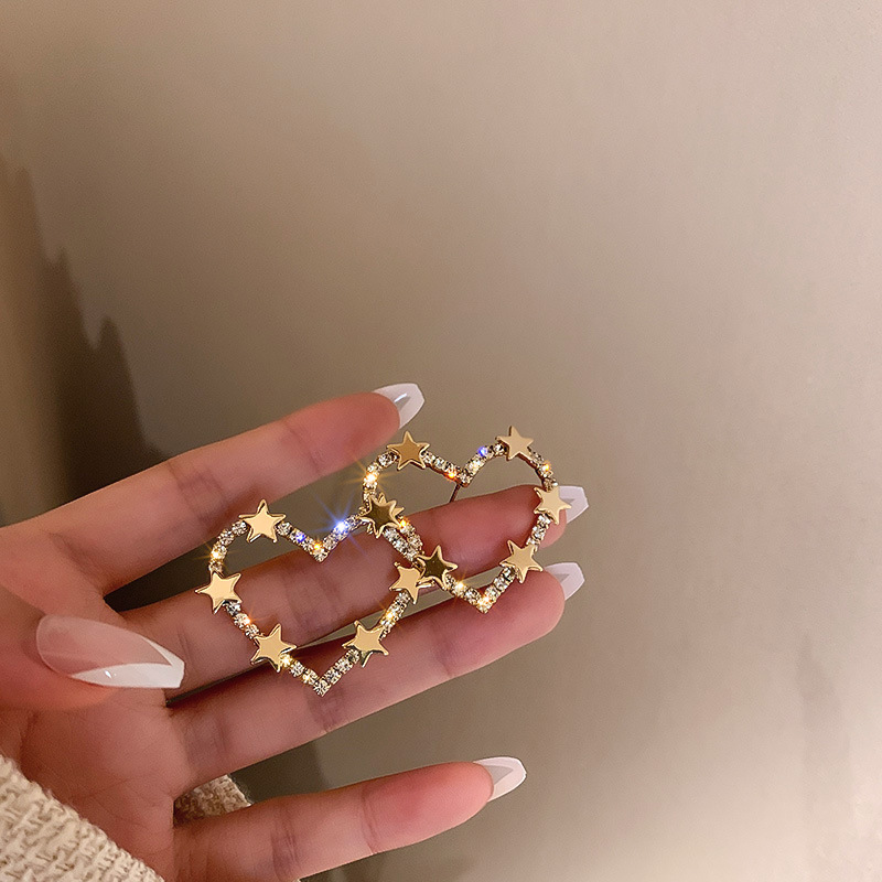 70eae11a 1edc 44de b24c 319f239d59ca Fashion Metal Cold Wind Earrings Simple