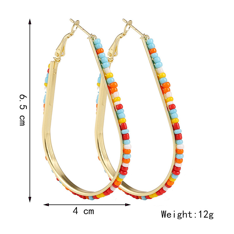 71a04c35 ab29 4b99 9d41 4882b34c9a0f Geometric Handmade Rice Beads Heart Earrings