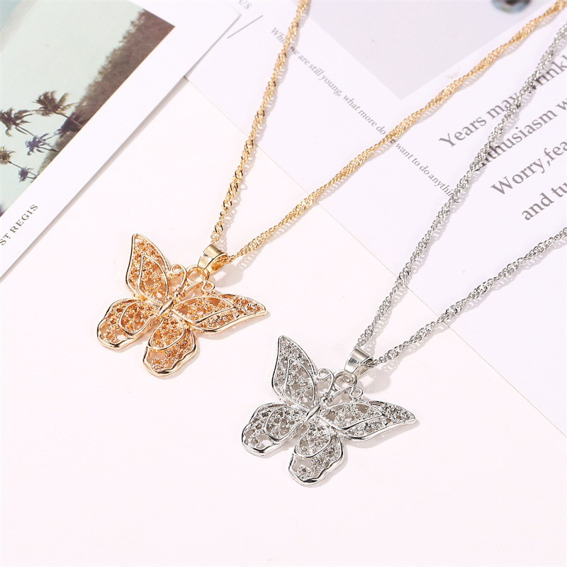 72cc1f7b 3008 456b 992b 60bd24593629 Hollow Double-layer Metal Butterfly European Style Pendant