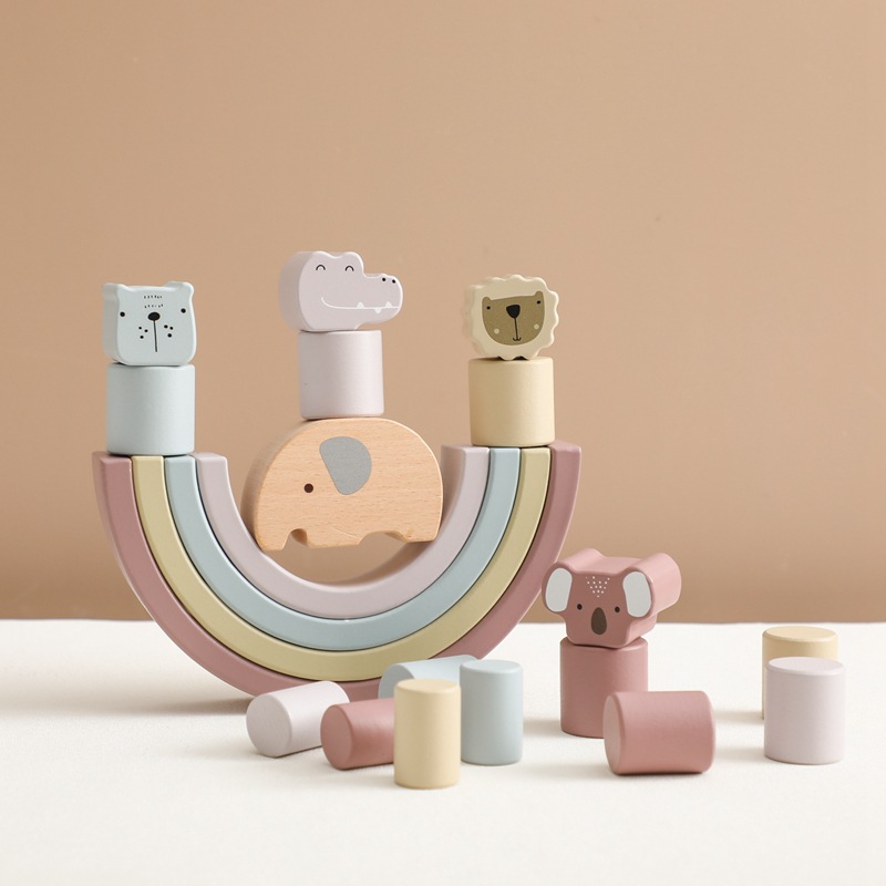 A set of pastel-colored, non-toxic Soulful Trading Montessori Educational Wooden Toys, shaped like animals and arches on a beige background.