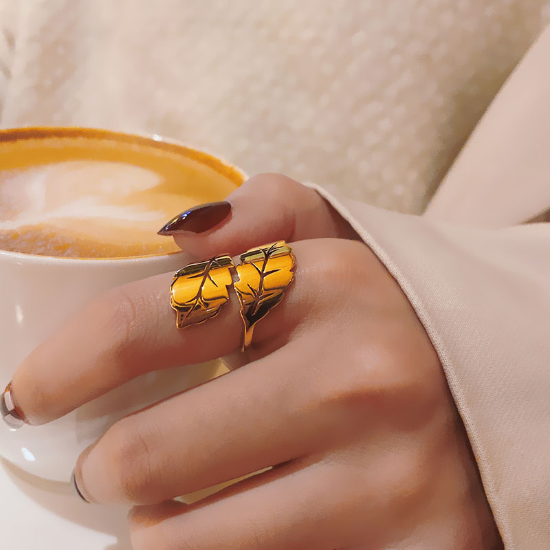 81bc1c91 5394 4904 b409 c80dc4d7f5f3 Simple Titanium Steel Ring Female Leaf 18k Gold Niche High-grade Sense