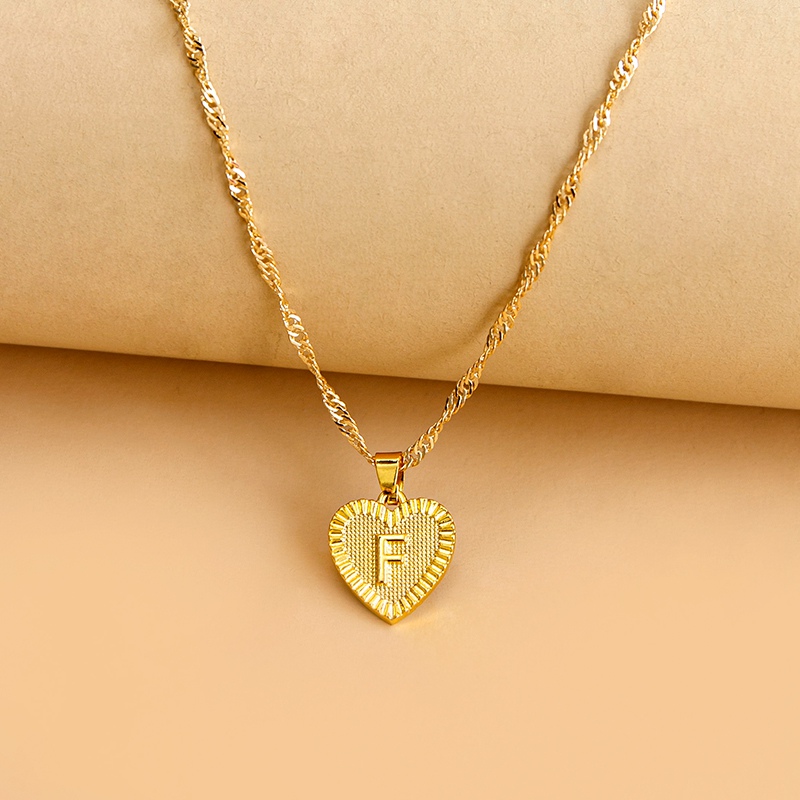 8398de95 84ce 4af9 a760 3046006bca4b Hexagon Imitation Gold Pendant Necklace Peach Heart