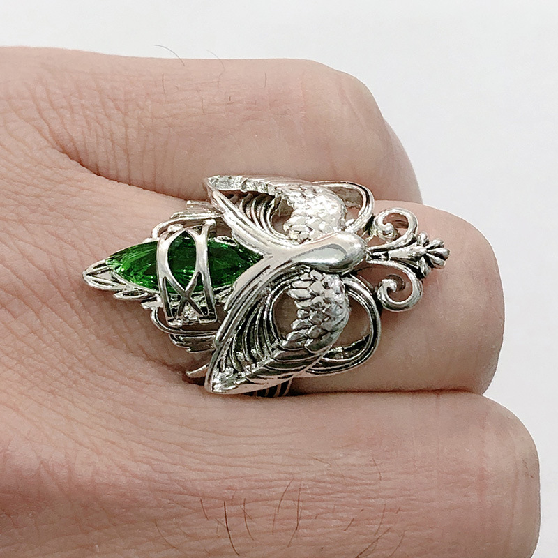 8a99fc7e a779 4454 b04e af833eaf5f18 European And American Inlaid Green Zircon Ring Women