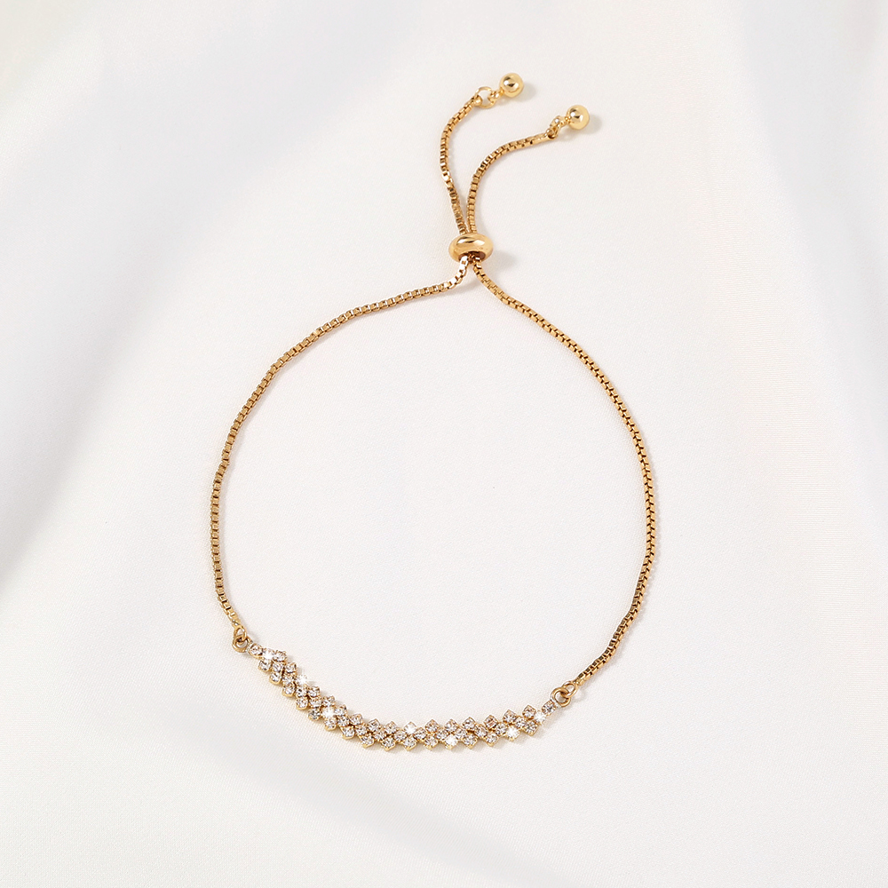 940455be 0b62 4d3a b486 6d59c47ffc1b Brass Gold Plated Long Micropaved Zircon Pendant Shrink Pulled Brass Bead Bracelet