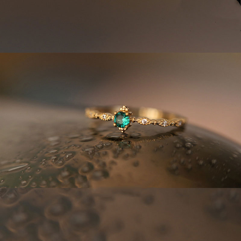 9876a8b8 f09f 4d09 b76f 24b186302fcd S925 Sterling Silver 14K Yellow Gold Plated Emerald Ring