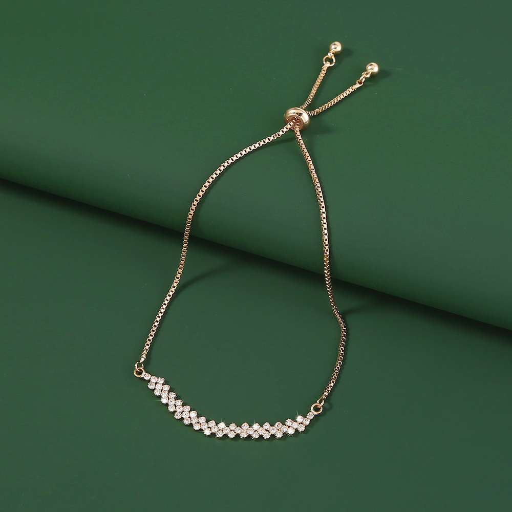 99021a0d d903 4fe6 9524 ff67433715fe Brass Gold Plated Long Micropaved Zircon Pendant Shrink Pulled Brass Bead Bracelet