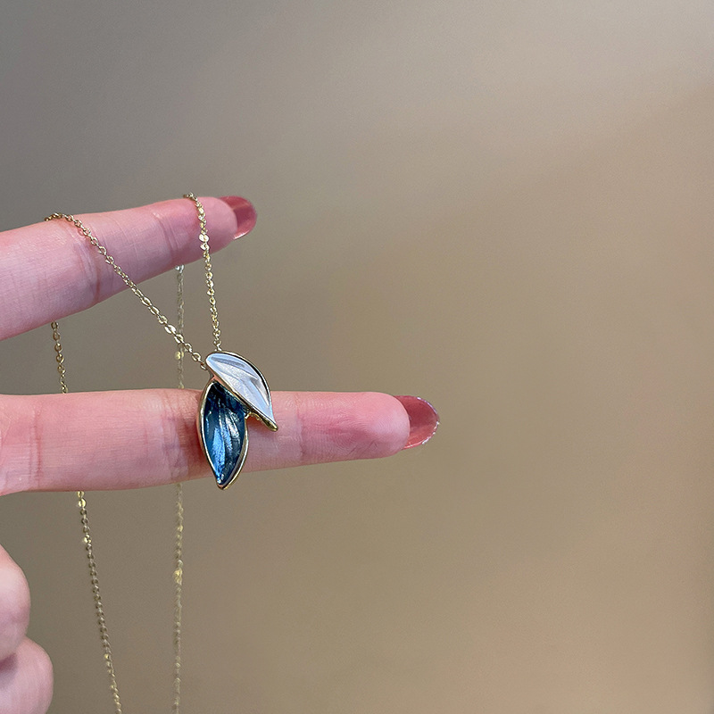 a270d05d 7f44 40f6 92dc 8744939febd7 Fashion 925 Silver Needle Contrast Color Leaf Earrings