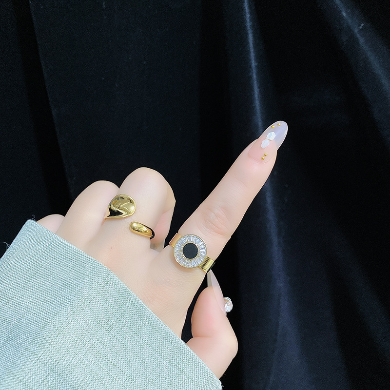 aba853ba f01c 4edb a40d 4d9abb962b7d European And American Micro Diamond Light Luxury Temperament Ring Titanium Steel