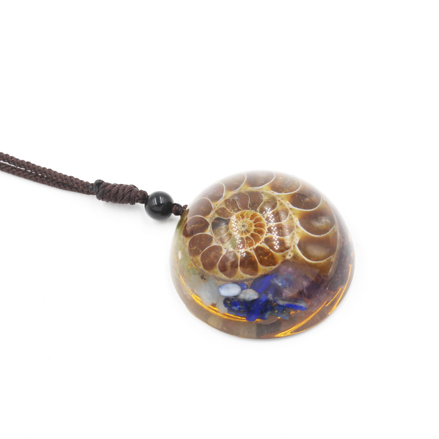 abb05d7f 7a63 4a32 896b c16fbcd9e6f9 Resin And Crystal Fossil Snail Hemisphere Handicraft Pendant