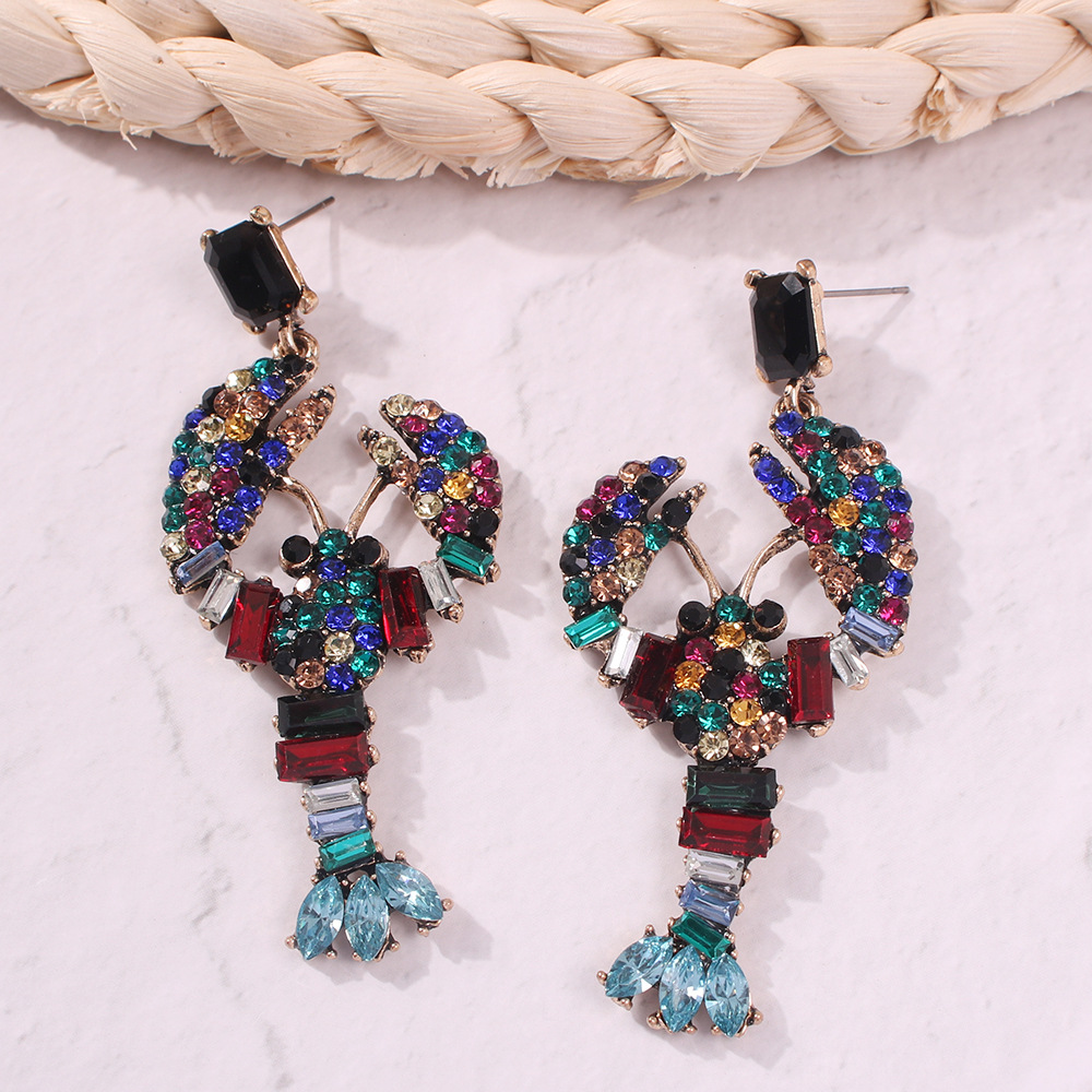 acaf8924 4bca 4754 811d 48d3586a103e Lobster Stud Earrings Color Diamond Earrings