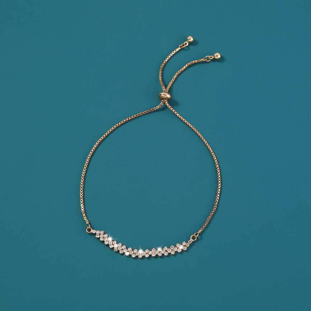 ae367952 a211 4a32 babb 65932e6bf4e5 Brass Gold Plated Long Micropaved Zircon Pendant Shrink Pulled Brass Bead Bracelet