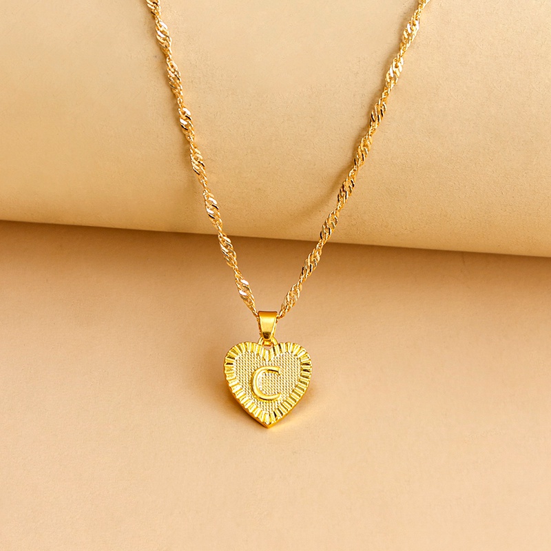 b41ee34d f271 4f16 b90d 56eb4dbf4b21 Hexagon Imitation Gold Pendant Necklace Peach Heart
