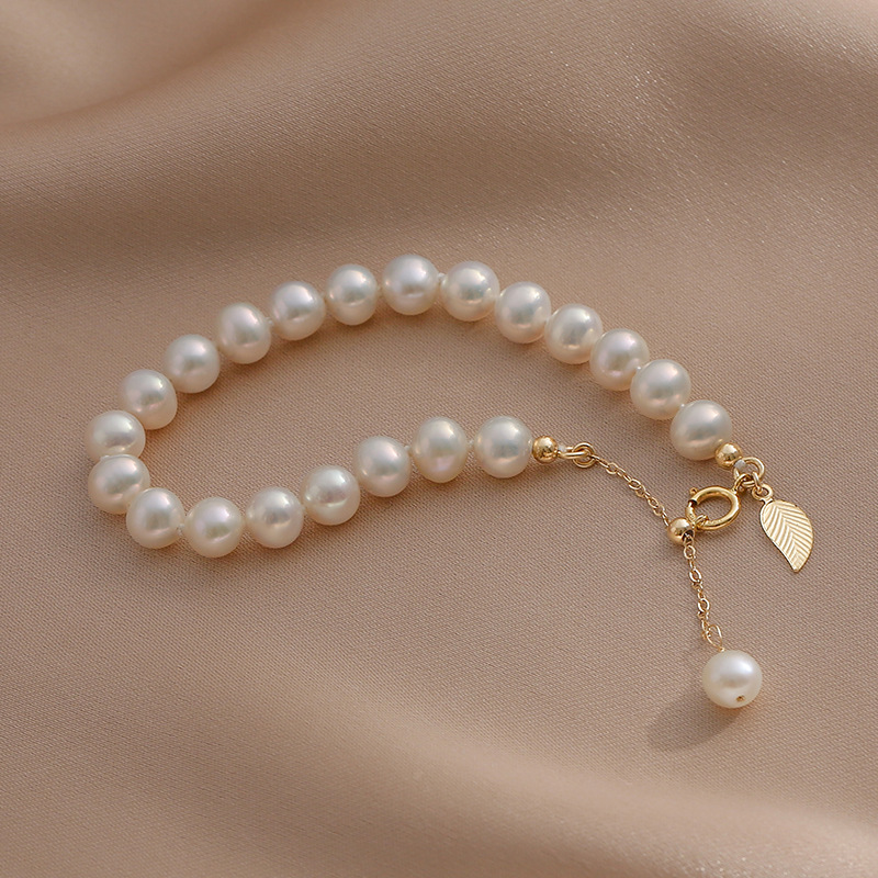 b668acc3 0137 47a9 aa1a b6f5539e3f29 Natural Freshwater Pearl 14K Gold Niche Design Elegant Bracelet