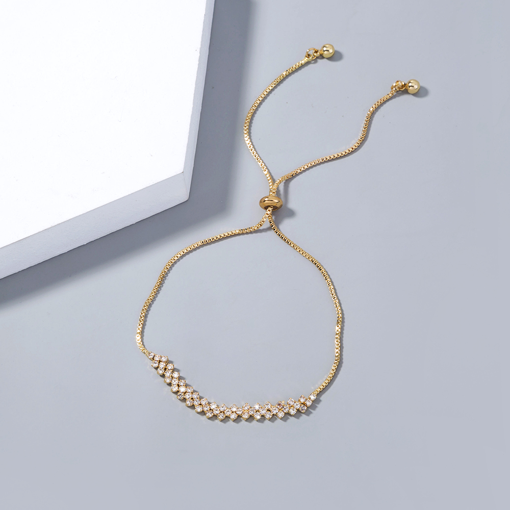 bb7bc313 46ea 47d0 8387 e732f7e41418 Brass Gold Plated Long Micropaved Zircon Pendant Shrink Pulled Brass Bead Bracelet