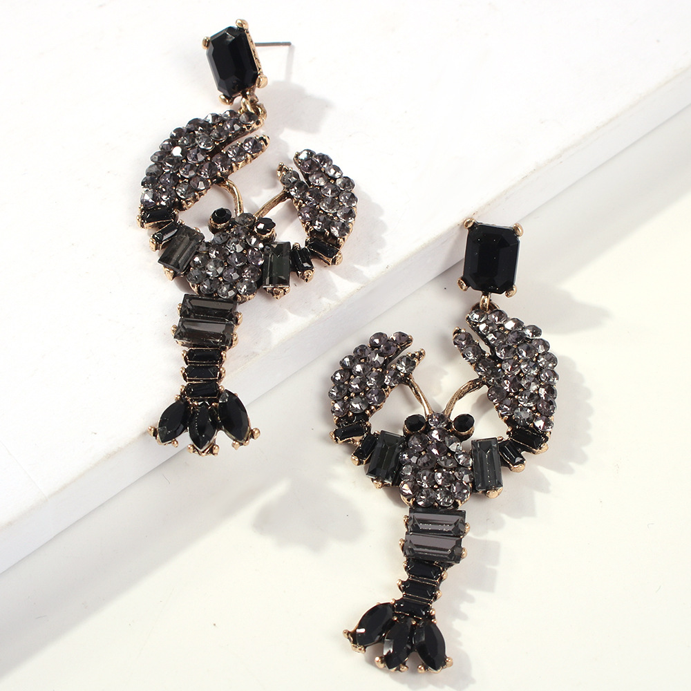 bb907b25 a596 49e3 b1ee 76d4014b85bf Lobster Stud Earrings Color Diamond Earrings