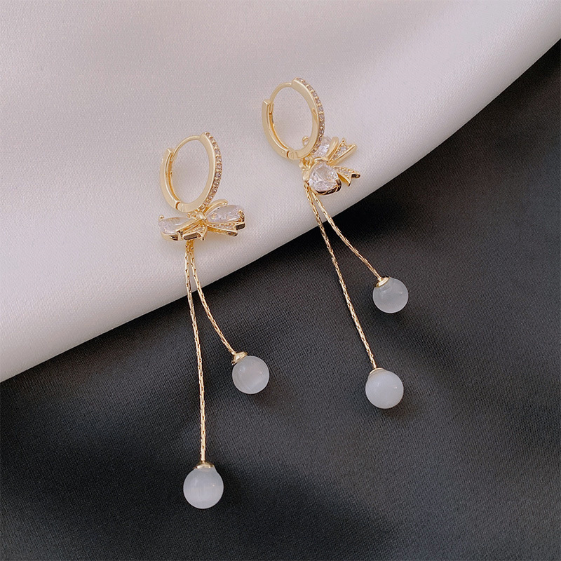 bfe19956 a067 455d a622 261ea5f6ac34 Fashion Women's Alloy Bow Cat's Eye Earrings