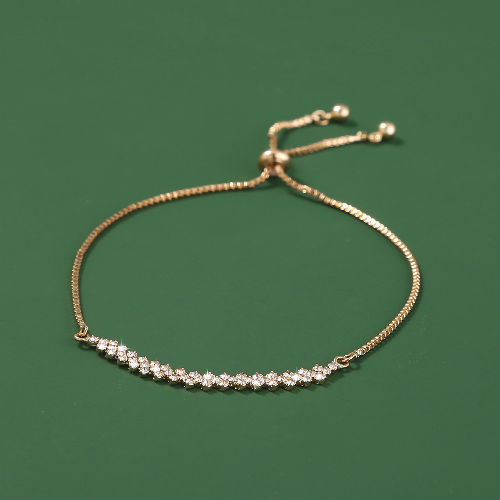 cb46bc63 96bb 4f82 9ba7 db38fc8f640a Brass Gold Plated Long Micropaved Zircon Pendant Shrink Pulled Brass Bead Bracelet